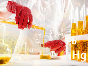 Scientist pouring organic oil. Beauty and cosmetics sciences. Laboratory equipment