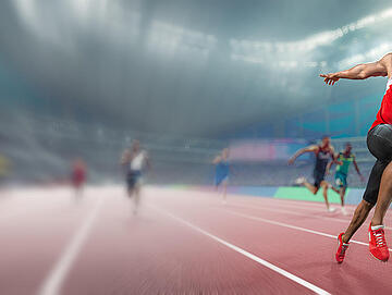Champion Athlete Wins Sprint Race Competition In Indoor Track Event Champion Athlete Wins Sprint Race Competition In Indoor Track Event